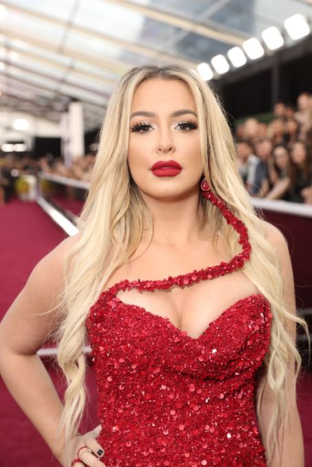 tana wearin a red gown 